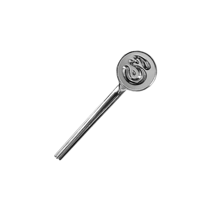 Metallic squeezer with a circular handle featuring a logo on a white background
